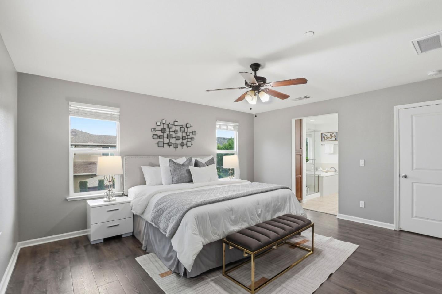 301 Promise Way Hollister, CA 95023 - Photo 6 of 22 a bedroom with a large bed a chandelier and window
