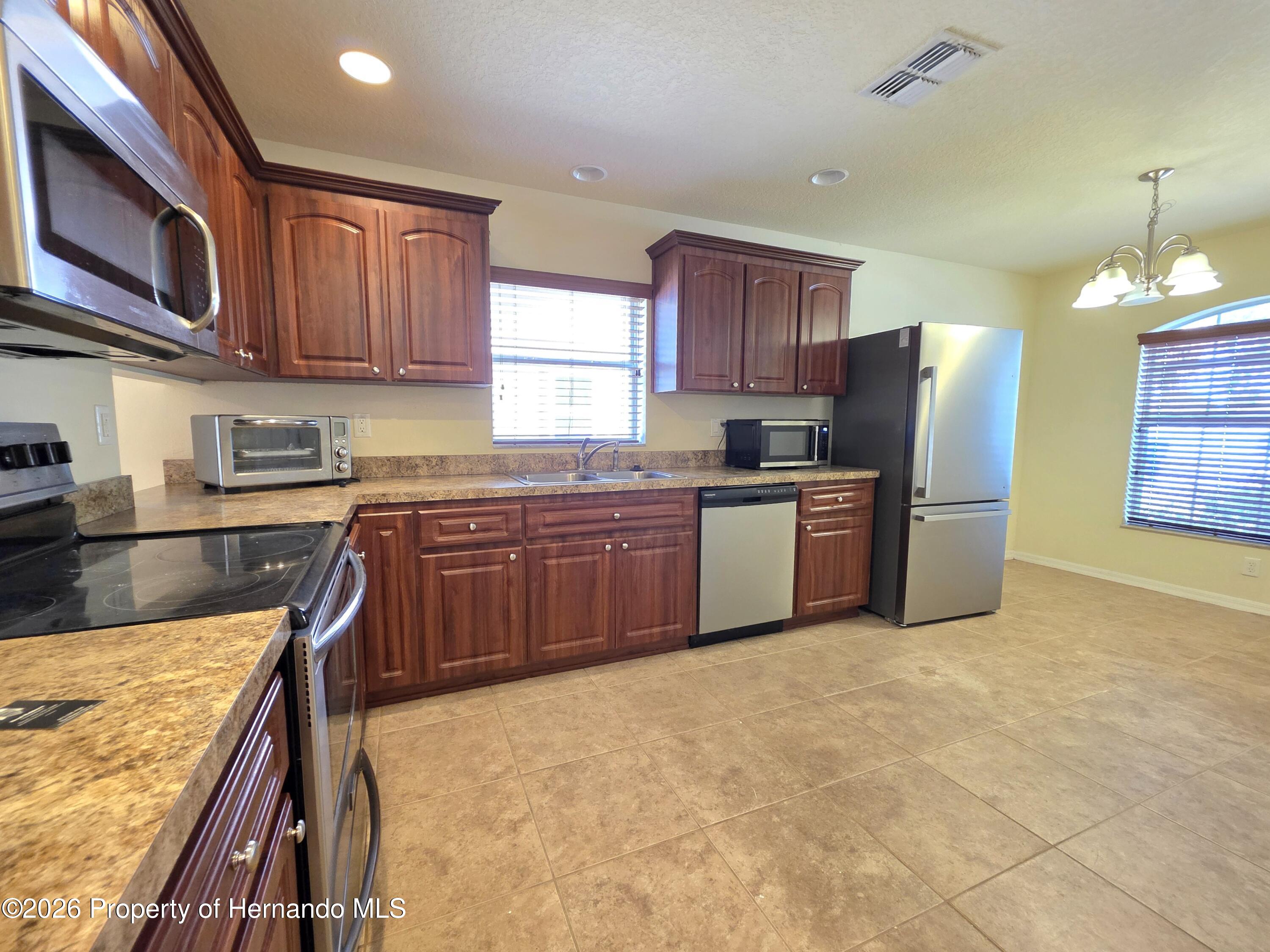4284 High Ridge Avenue Spring Hill, FL 34609 - Photo 11 of 39 Gallery Image 11