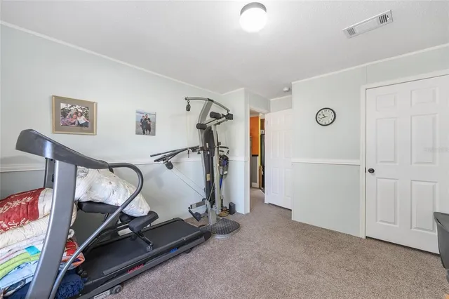 a view of a dinning table and chairs in patio