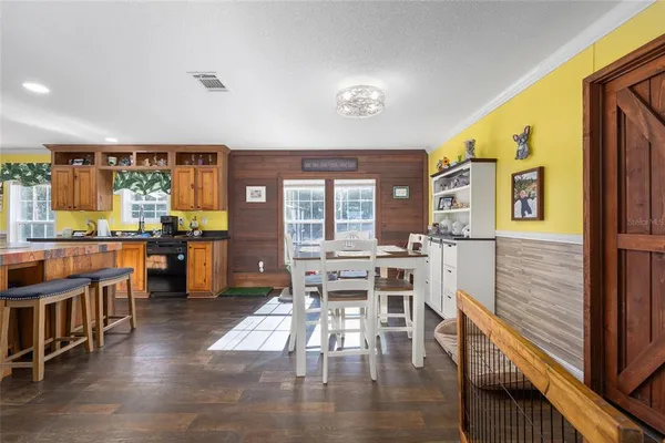 a view of a dining room with furniture