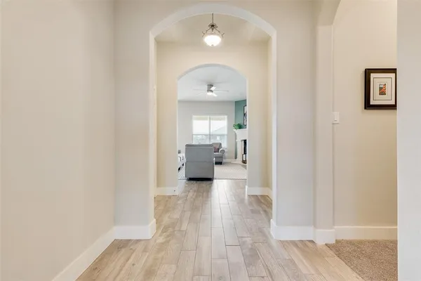 a view of a room with wooden floor bathroom and bathroom