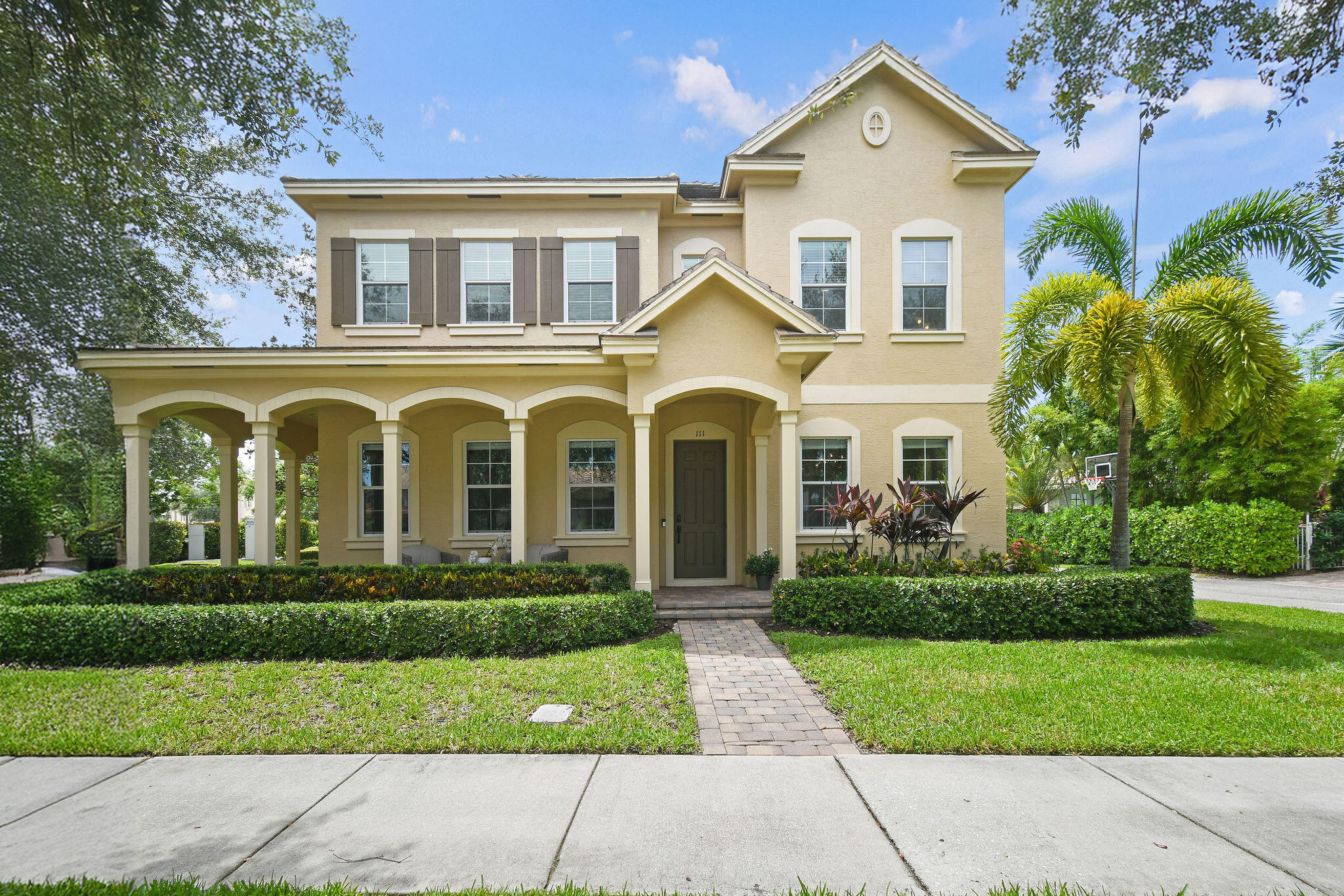 111 Tullamore Avenue Jupiter, FL 33458 - Photo 1 of 63 front view of a house with a yard