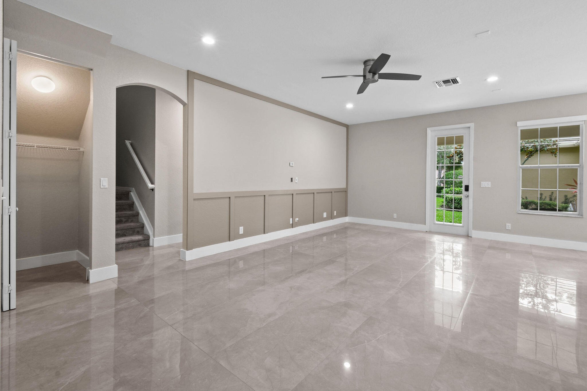 111 Tullamore Avenue Jupiter, FL 33458 - Photo 13 of 63 a view of an empty room with a window