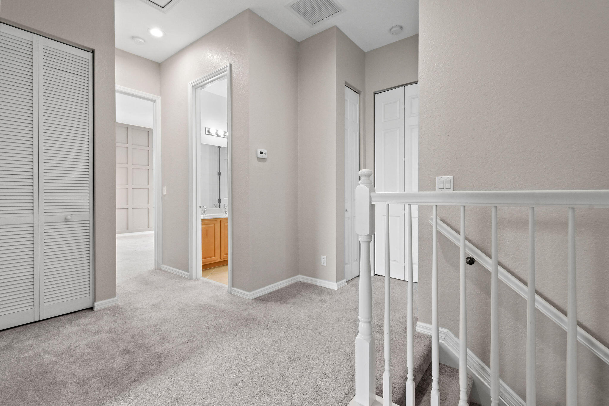 111 Tullamore Avenue Jupiter, FL 33458 - Photo 29 of 63 a view of a hallway with wooden floor and entryway
