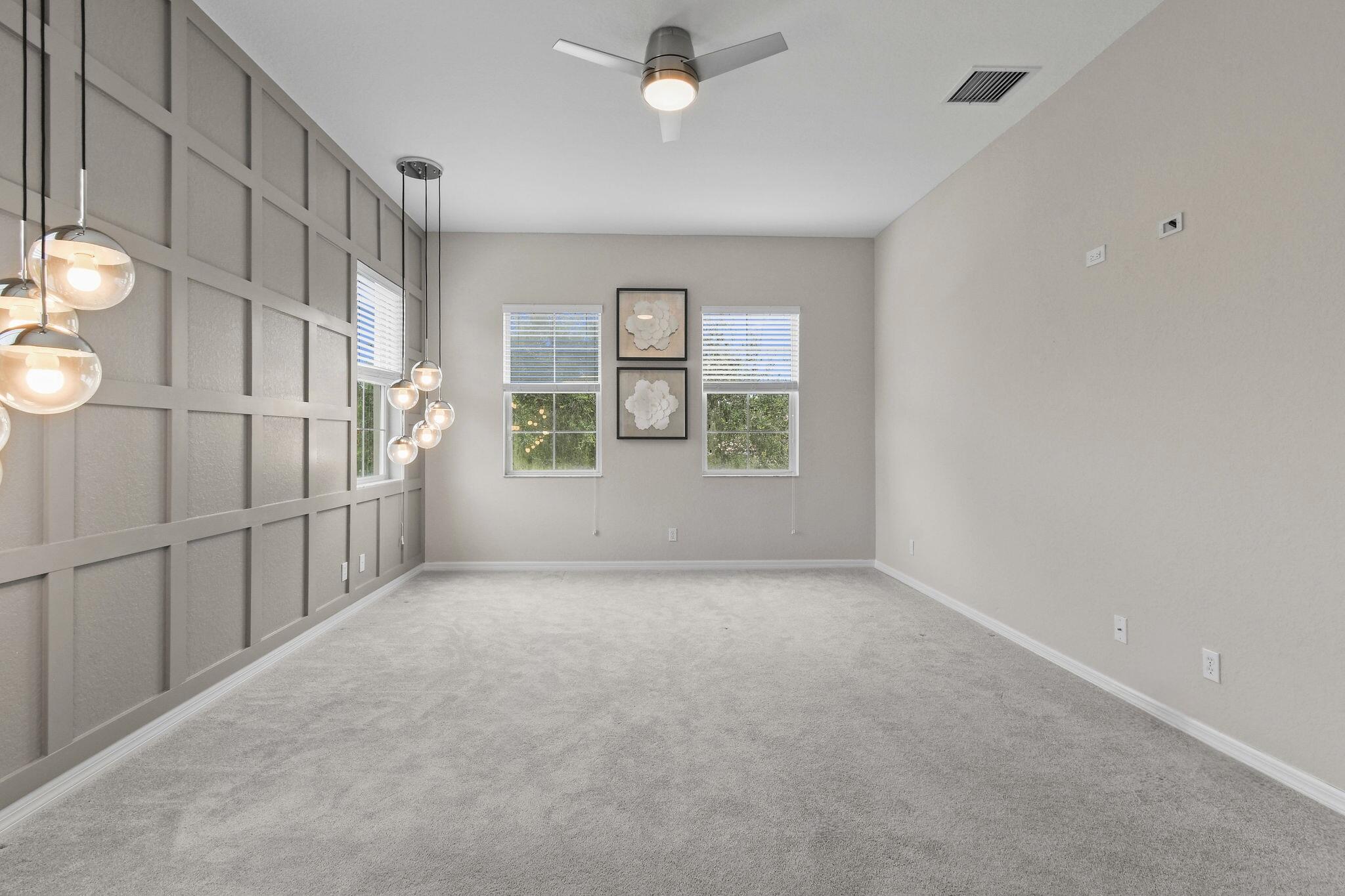 111 Tullamore Avenue Jupiter, FL 33458 - Photo 41 of 63 a view of an empty room with a window