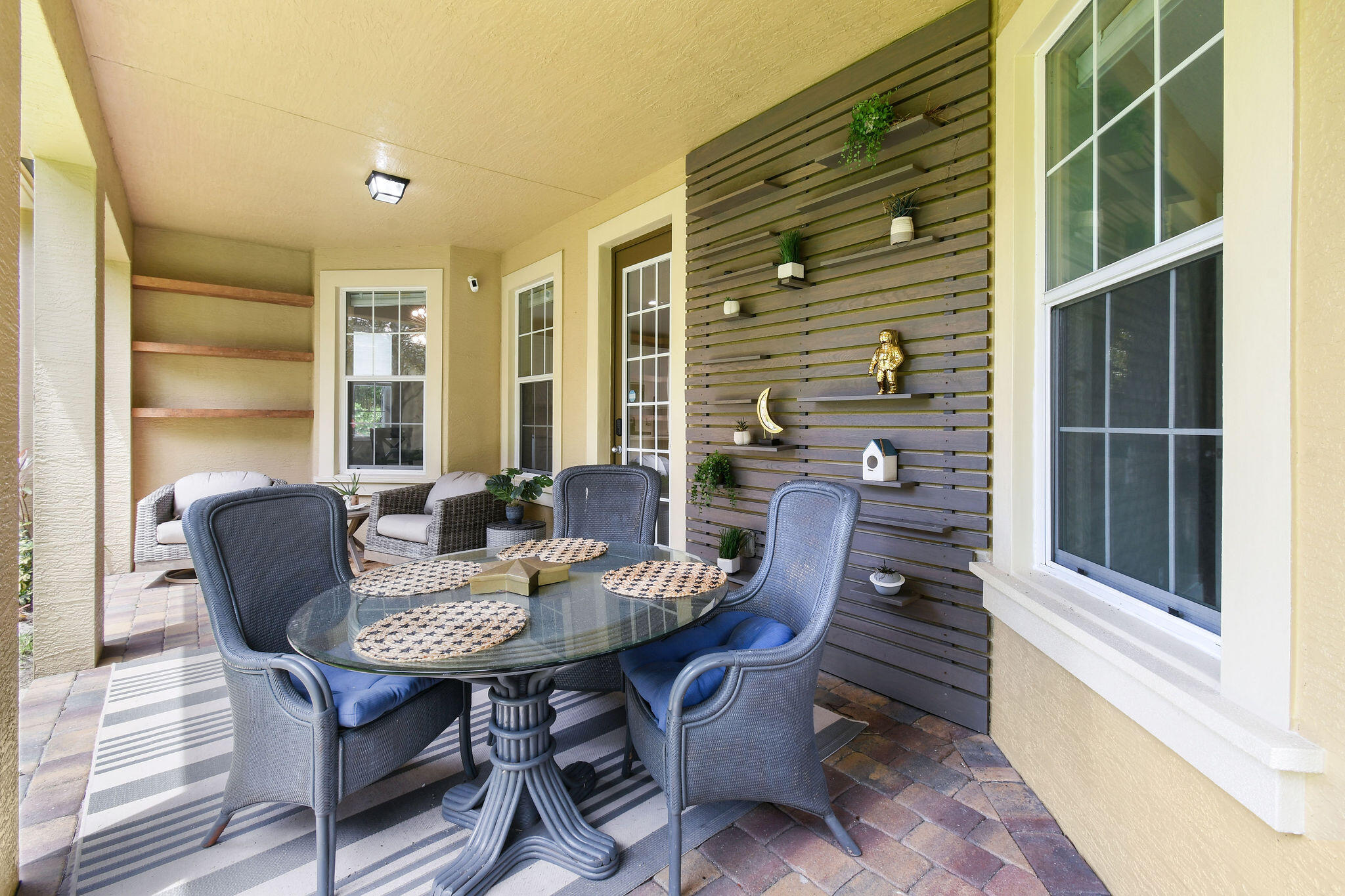 111 Tullamore Avenue Jupiter, FL 33458 - Photo 47 of 63 a view of a dining room with furniture window and wooden floor
