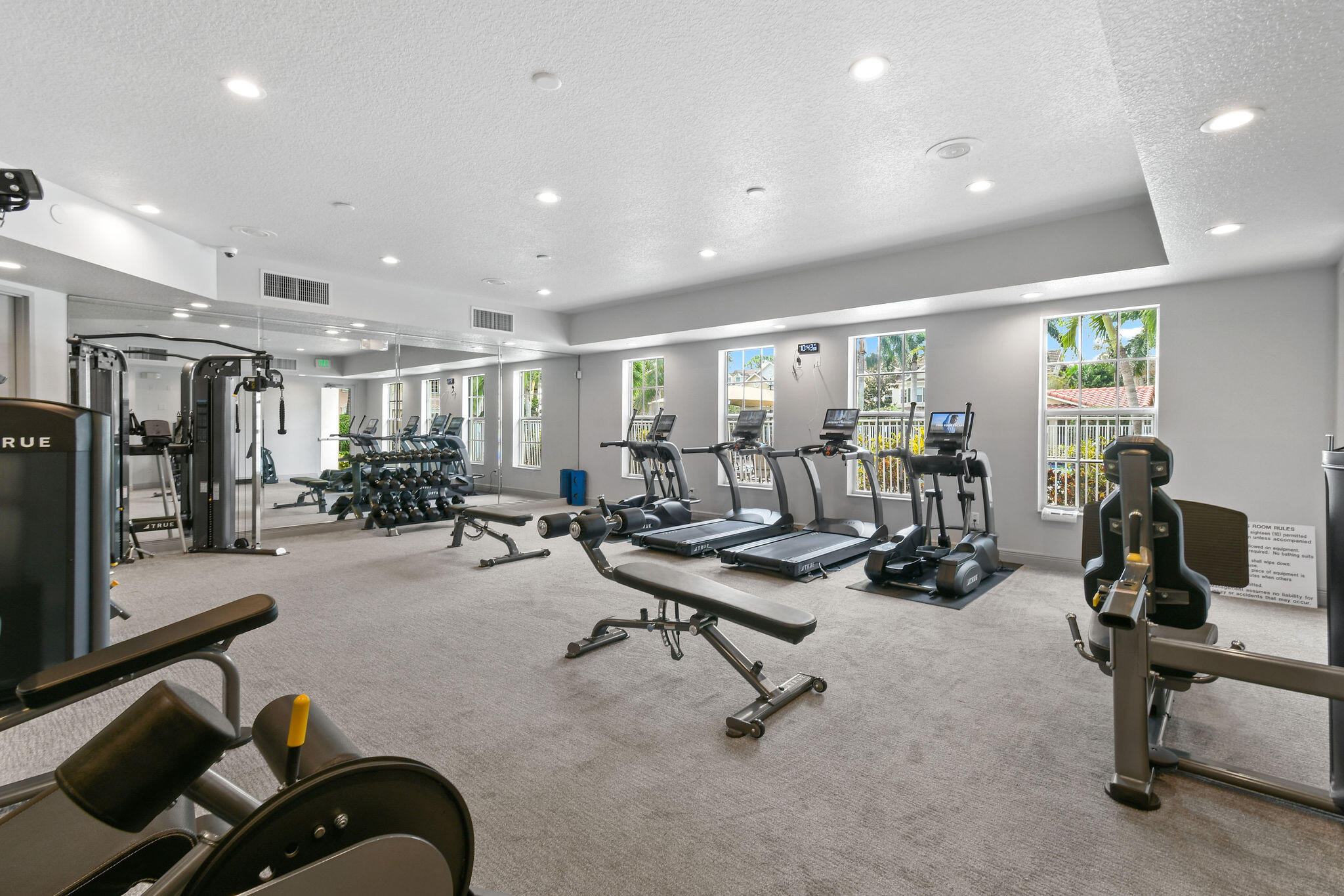 111 Tullamore Avenue Jupiter, FL 33458 - Photo 60 of 63 a view of a livingroom with workspace and a couch