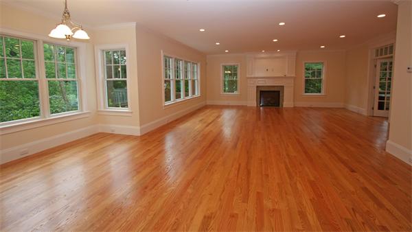 7 Royalston Road Wellesley, MA 02481 - Photo 12 of 30 an empty room with wooden floor fireplace and windows