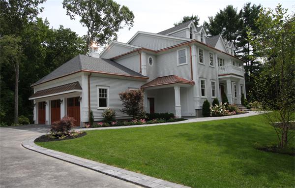 7 Royalston Road Wellesley, MA 02481 - Photo 2 of 30 a view of a white house in front of a yard with potted plants