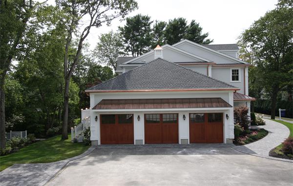 7 Royalston Road Wellesley, MA 02481 - Photo 5 of 30 a front view of a house with a garage