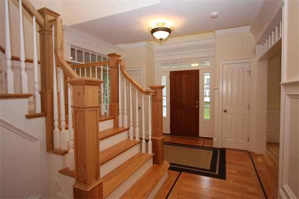 7 Royalston Road Wellesley, MA 02481 - Photo 9 of 30 a view of staircase with wooden floor and fan