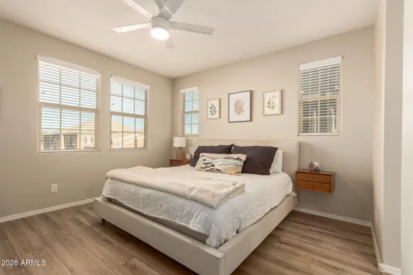 a bedroom with a bed and window