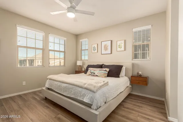 a bedroom with a bed and window