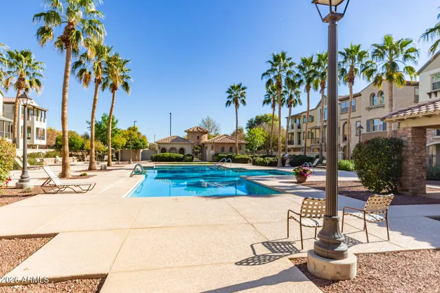 a view of a yard with cars