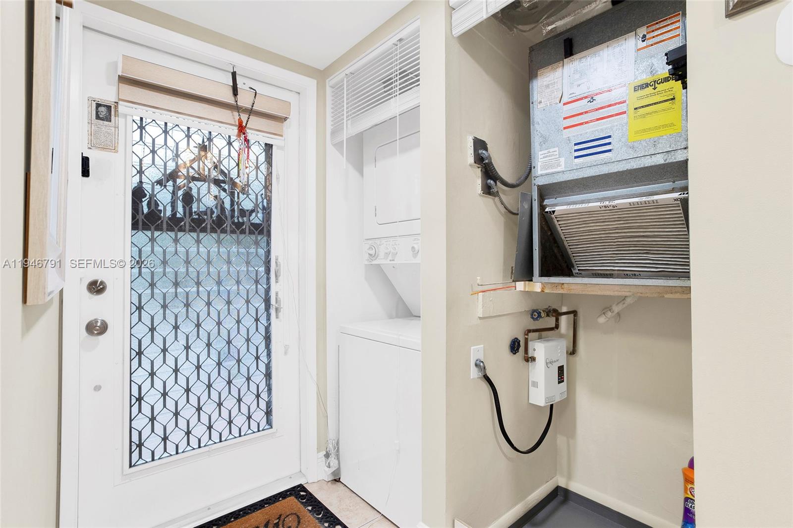 2941 North Nob Hill Road, Unit 208 Sunrise, FL 33322 - Photo 31 of 40 a bathroom with a walk in closet and a window
