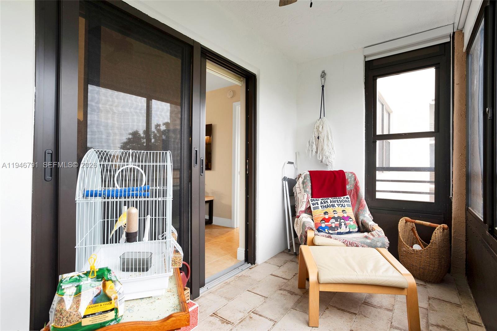 2941 North Nob Hill Road, Unit 208 Sunrise, FL 33322 - Photo 33 of 40 a workspace with furniture and a window