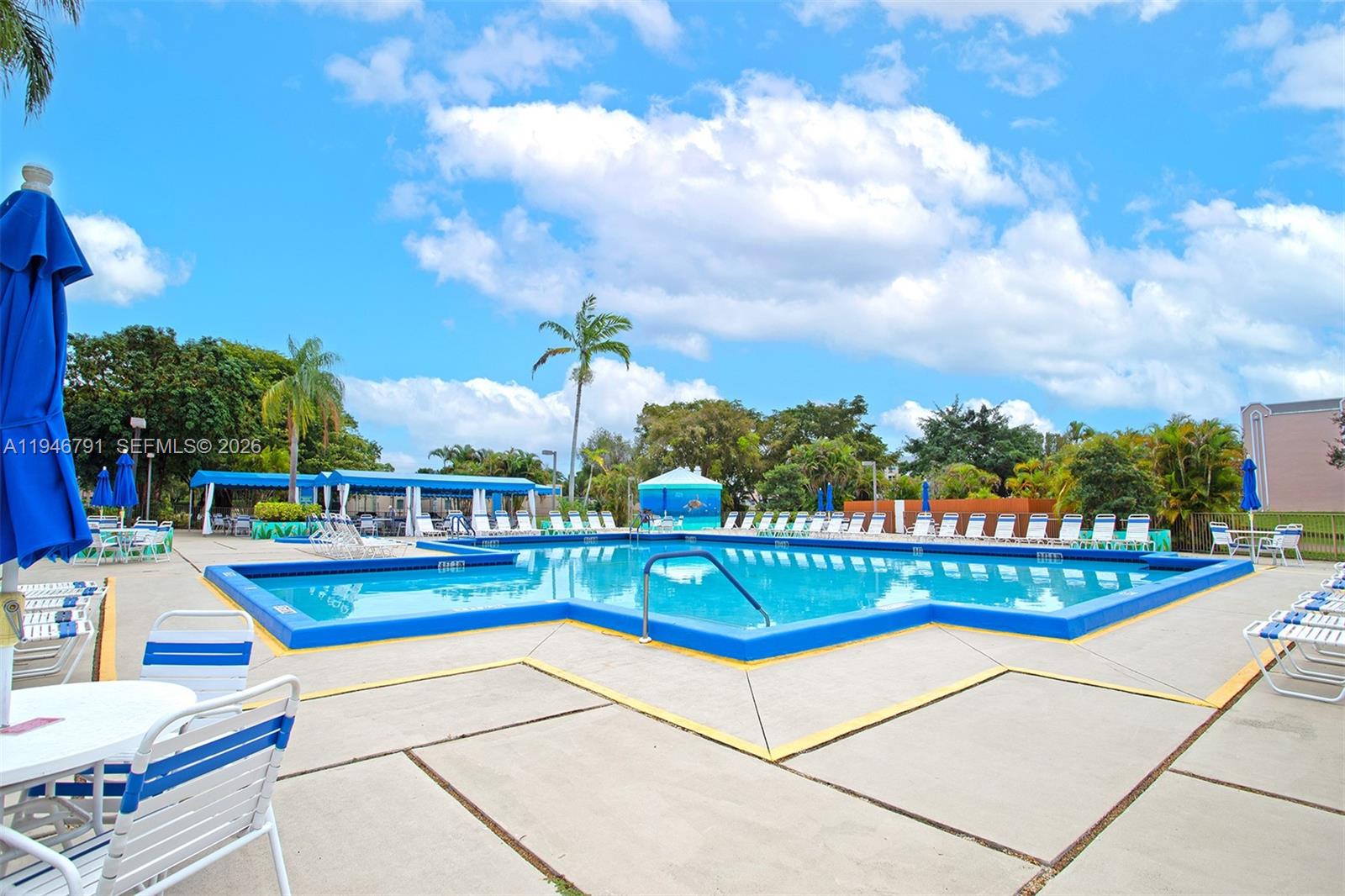 2941 North Nob Hill Road, Unit 208 Sunrise, FL 33322 - Photo 36 of 40 a view of a terrace with sitting area