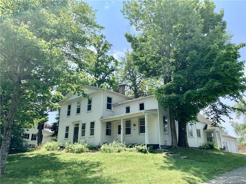 42 Old Middle Street Goshen, CT 06756 - Photo 1 of 1 a front view of a house with a yard and trees