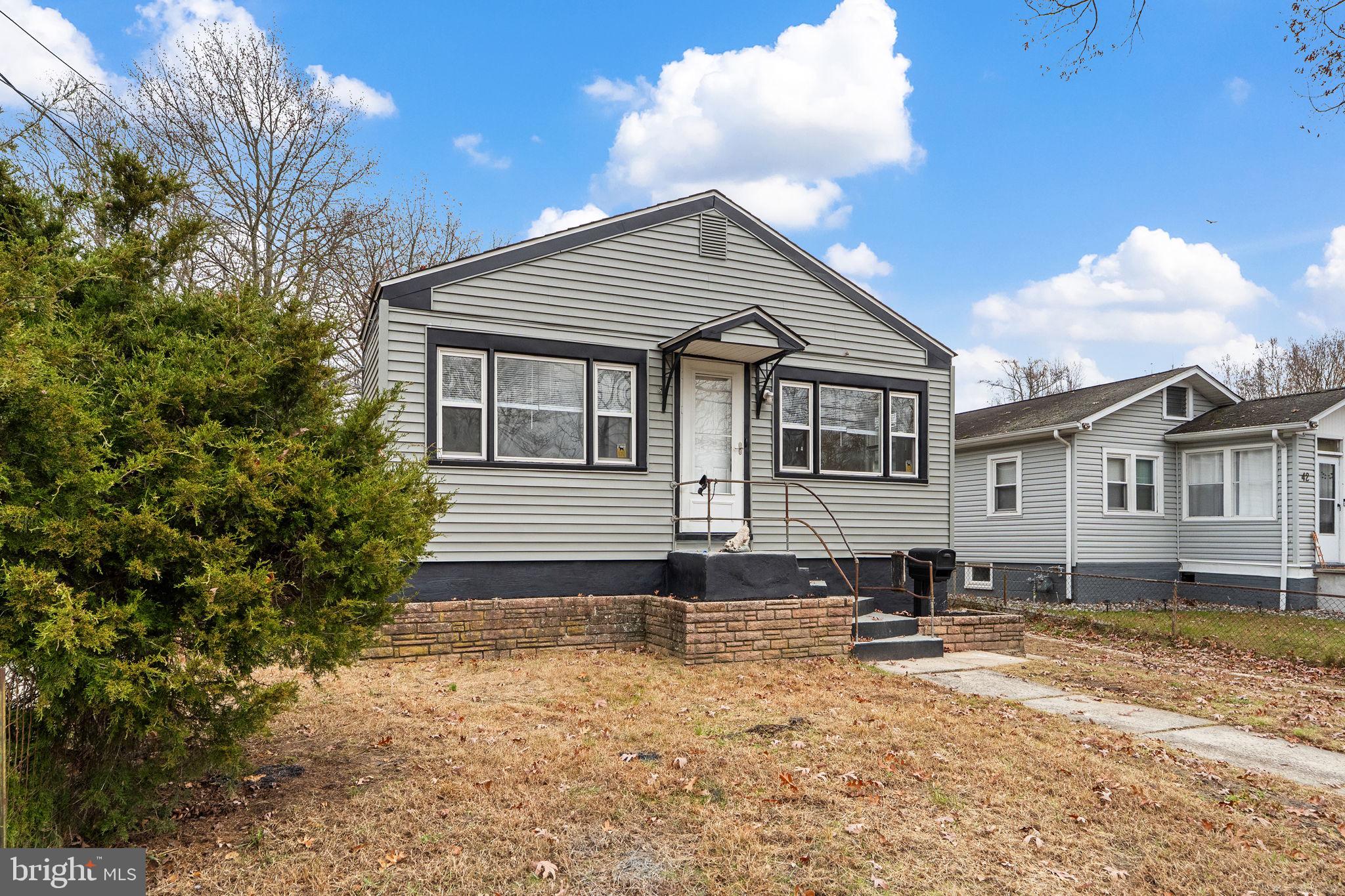 40 Wilson Road Clementon, NJ 08021 - Photo 2 of 31 a front view of a house with a yard