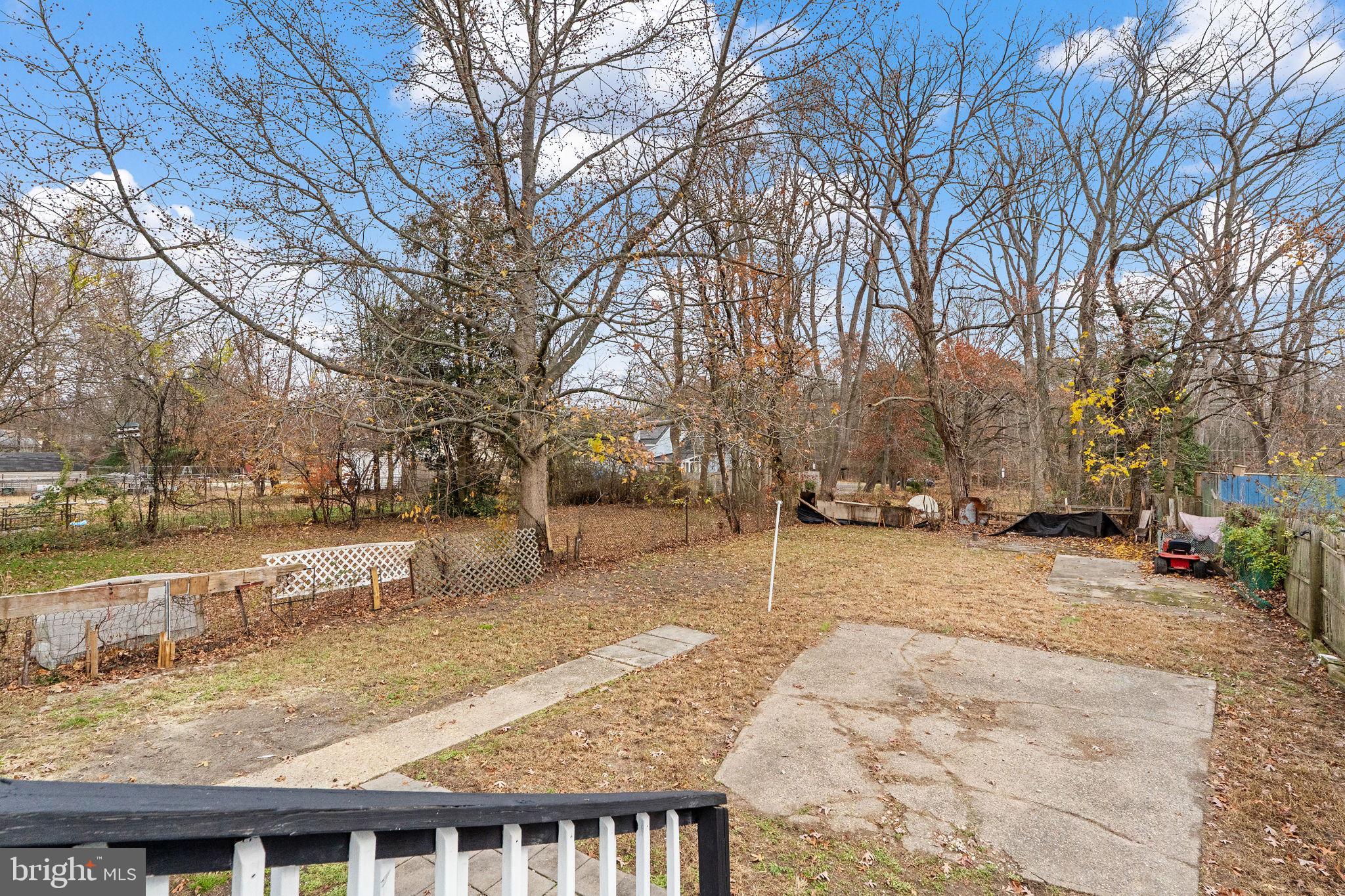 40 Wilson Road Clementon, NJ 08021 - Photo 26 of 31 a view of a yard with snow on the road