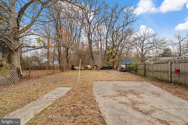 a view of a backyard of the house