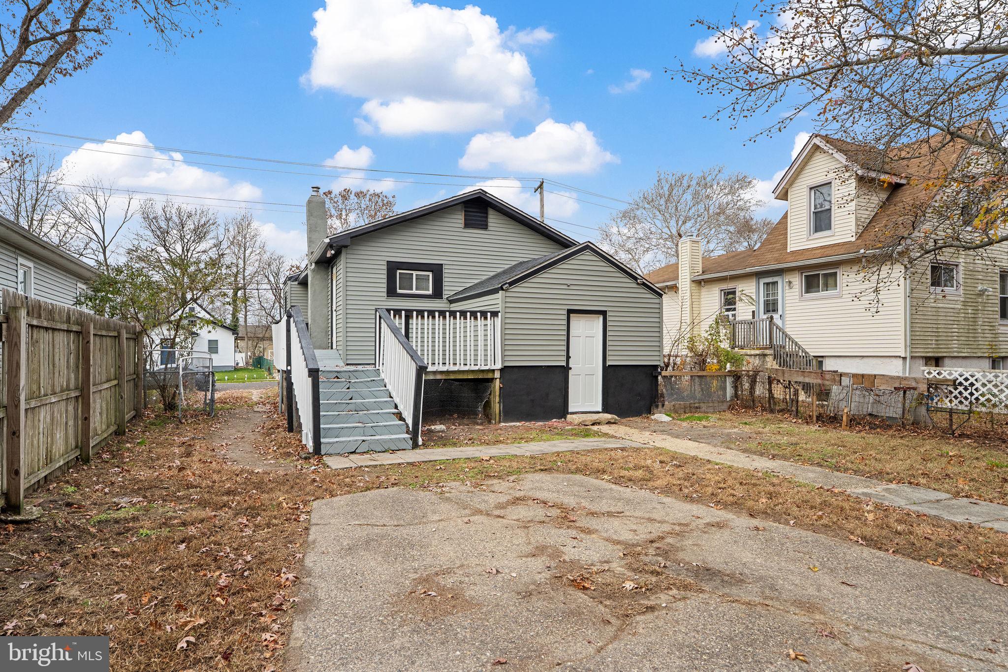 40 Wilson Road Clementon, NJ 08021 - Photo 30 of 31 a view of a house with a yard and garage