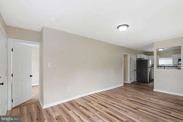 a view of a livingroom with wooden floor