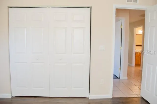 a view of small space with wooden floor