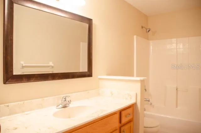 a bathroom with a sink and a bathtub