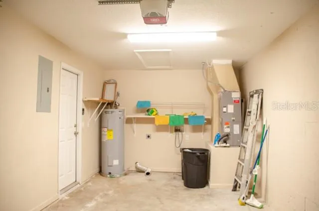 a view of a storage & utility room with a sink