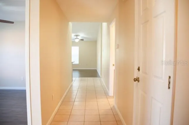 a bathroom with a sink and shower