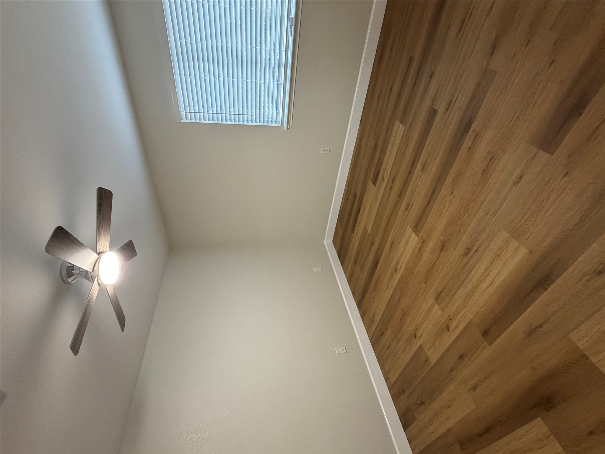 4604 Ramies Run Austin, TX 78749 - Photo 27 of 38 Rich wood-plank flooring and clean baseboards define this versatile bedroom space.
