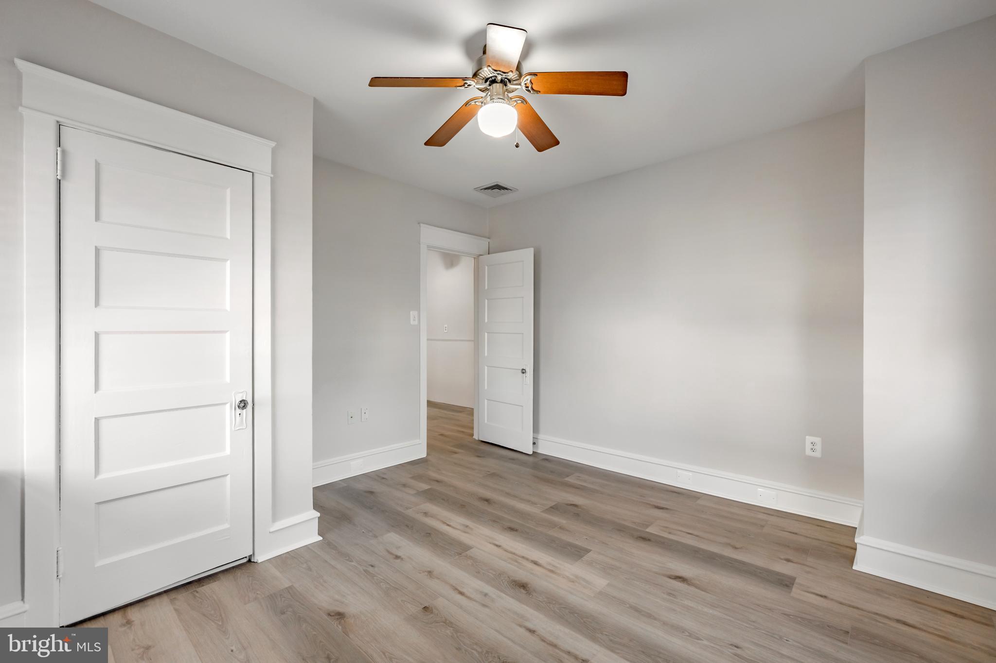 1210 West Darby Road Havertown, PA 19083 - Photo 11 of 33 wooden floor in an empty room with a window