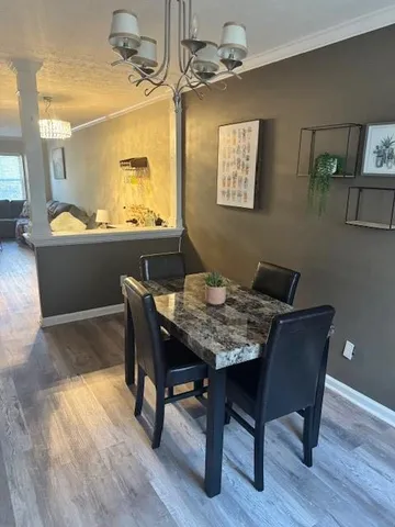 a bathroom with a toilet and a shower curtain
