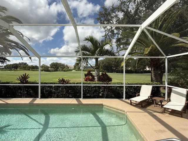 a view of outdoor space with swimming pool
