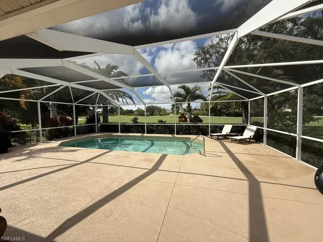 a view of outdoor space with swimming pool
