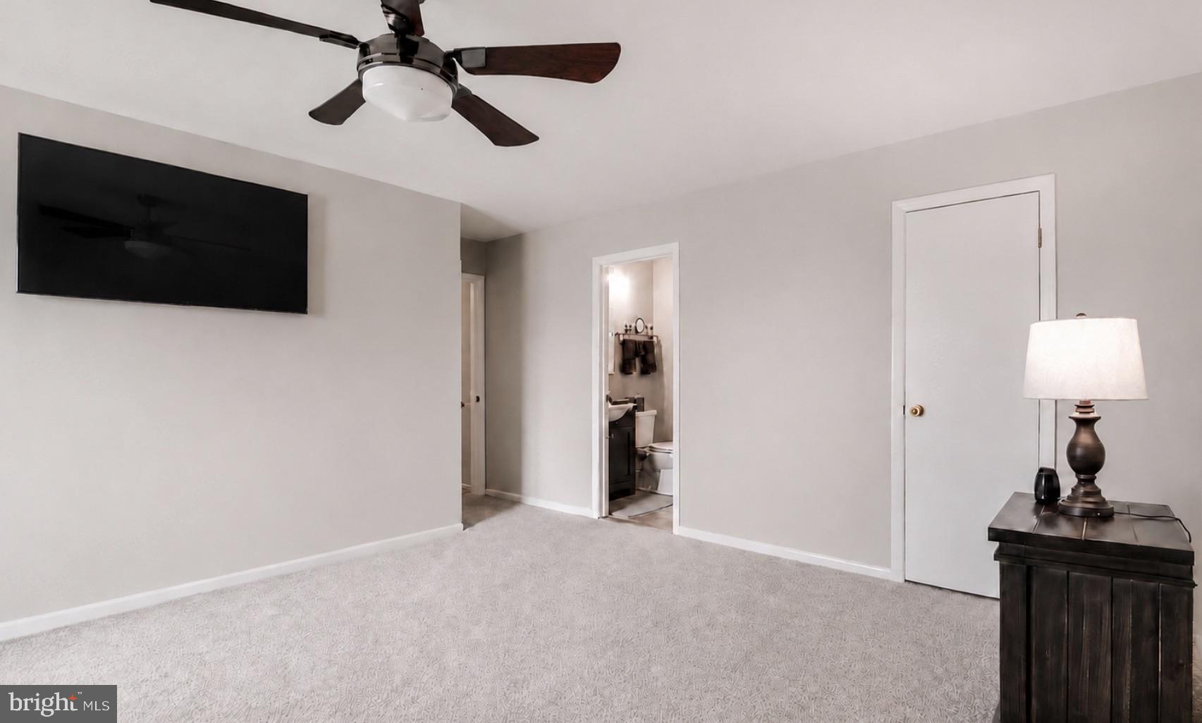 8 Juliet Lane, Unit 304 Nottingham, MD 21236 - Photo 5 of 10 a view of a livingroom with a flat screen tv