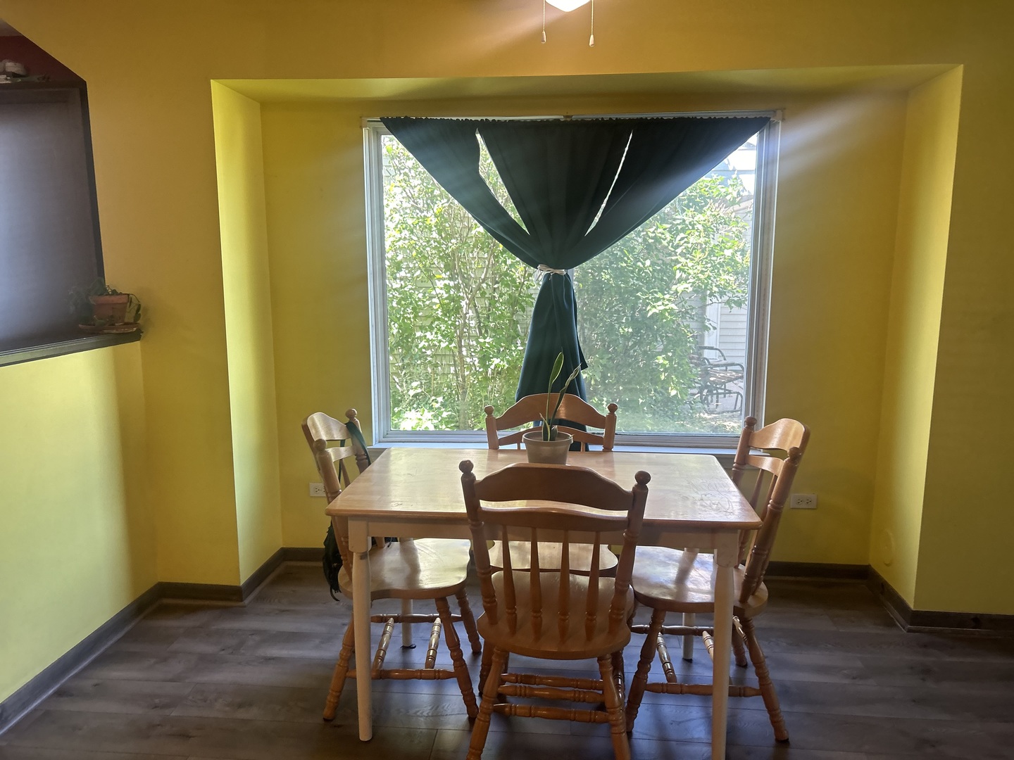 2495 Roxbury Lane Montgomery, IL 60538 - Photo 3 of 9 a view of a dining room with furniture and wooden floor