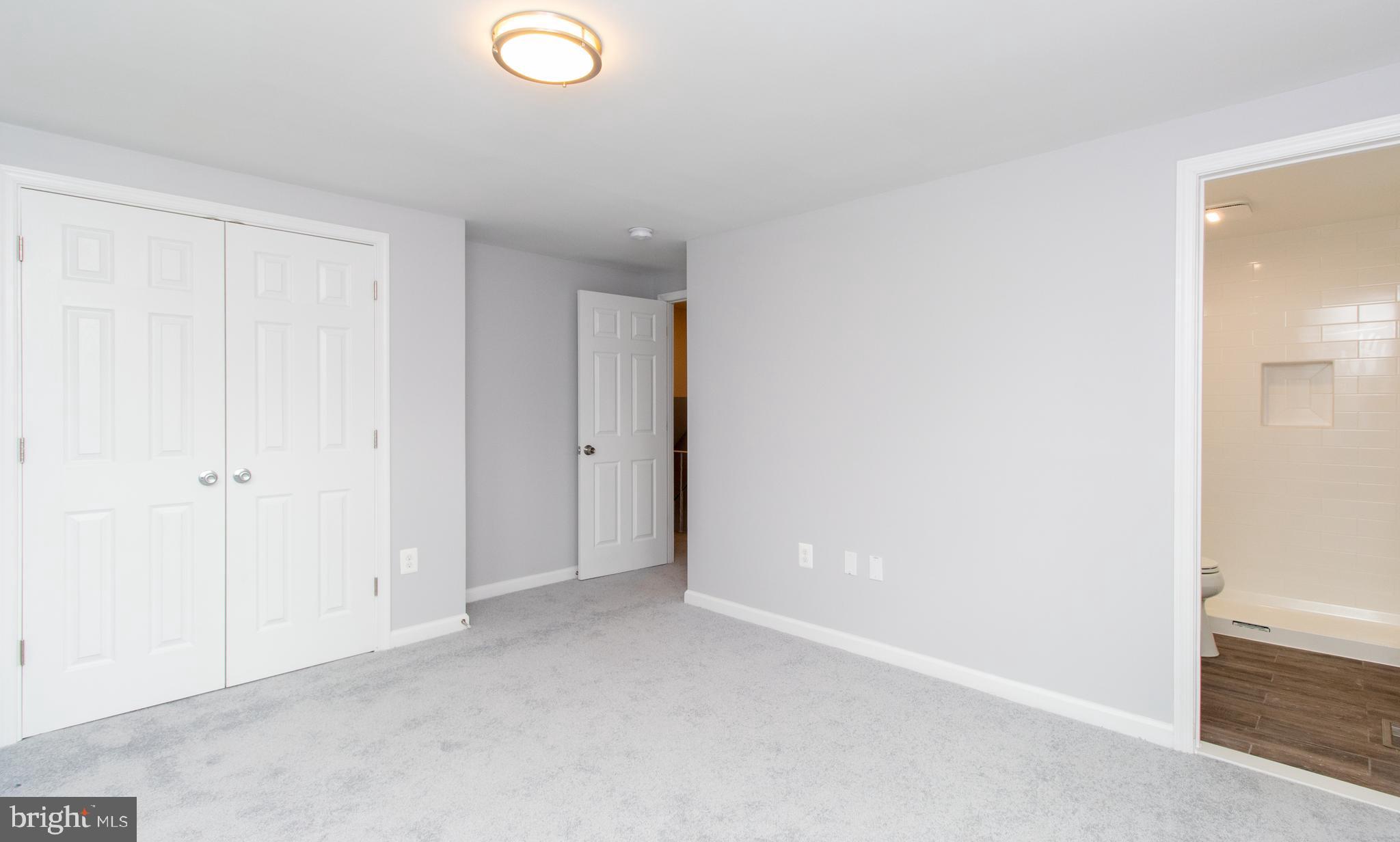 7701 Burnside Road Landover, MD 20785 - Photo 14 of 20 Primary Bedroom