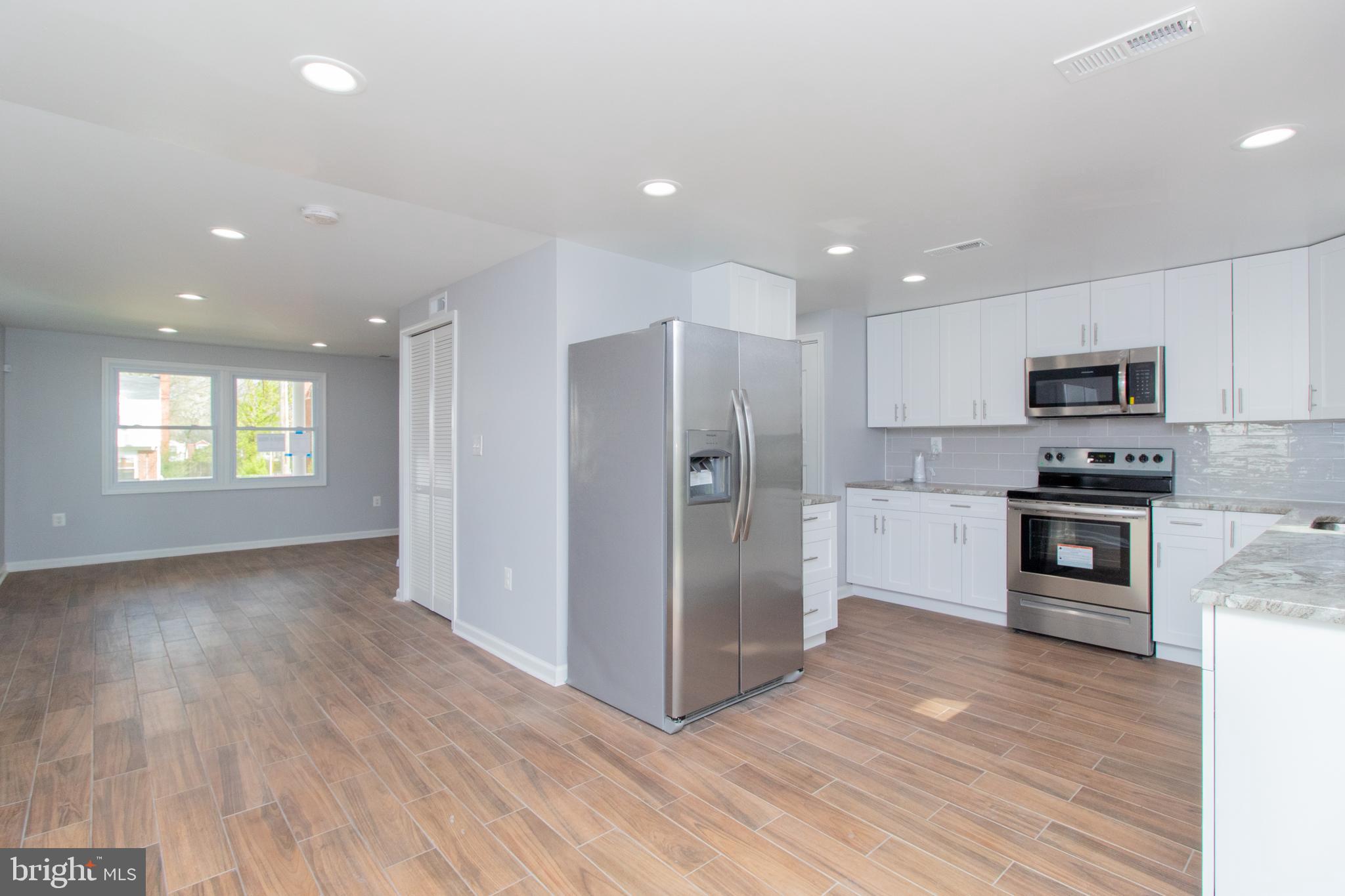 7701 Burnside Road Landover, MD 20785 - Photo 8 of 20 Kitchen and Dining Area