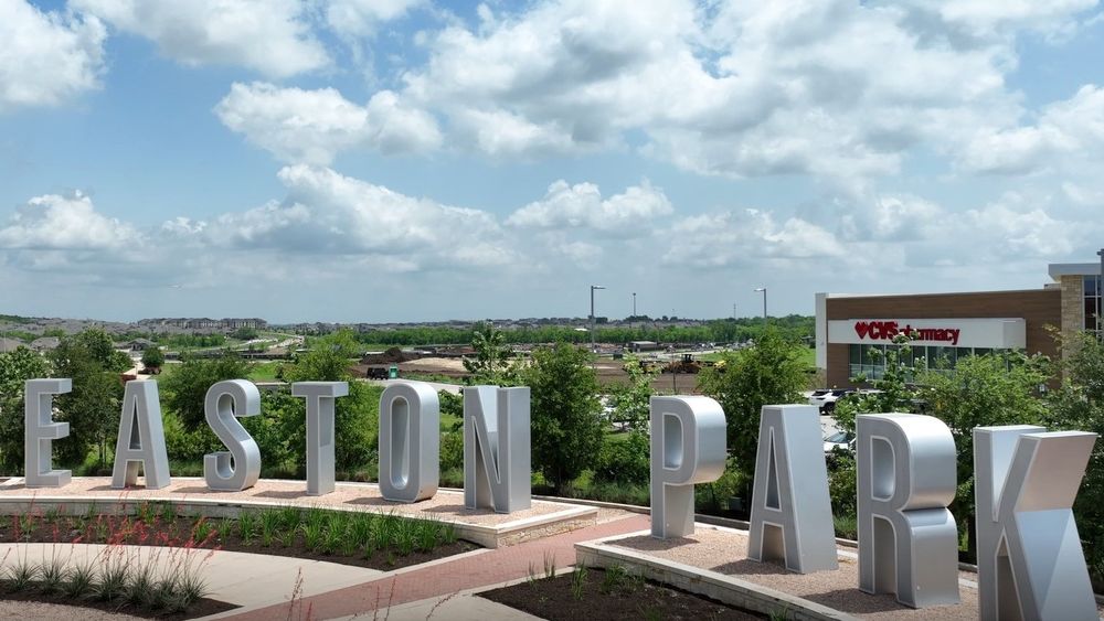 9104 The Ravine Way Austin, TX 78744 - Photo 19 of 29 a view of a city from a furniture