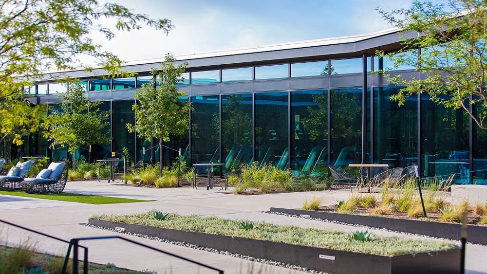 9104 The Ravine Way Austin, TX 78744 - Photo 23 of 29 a view of a swimming pool with a patio