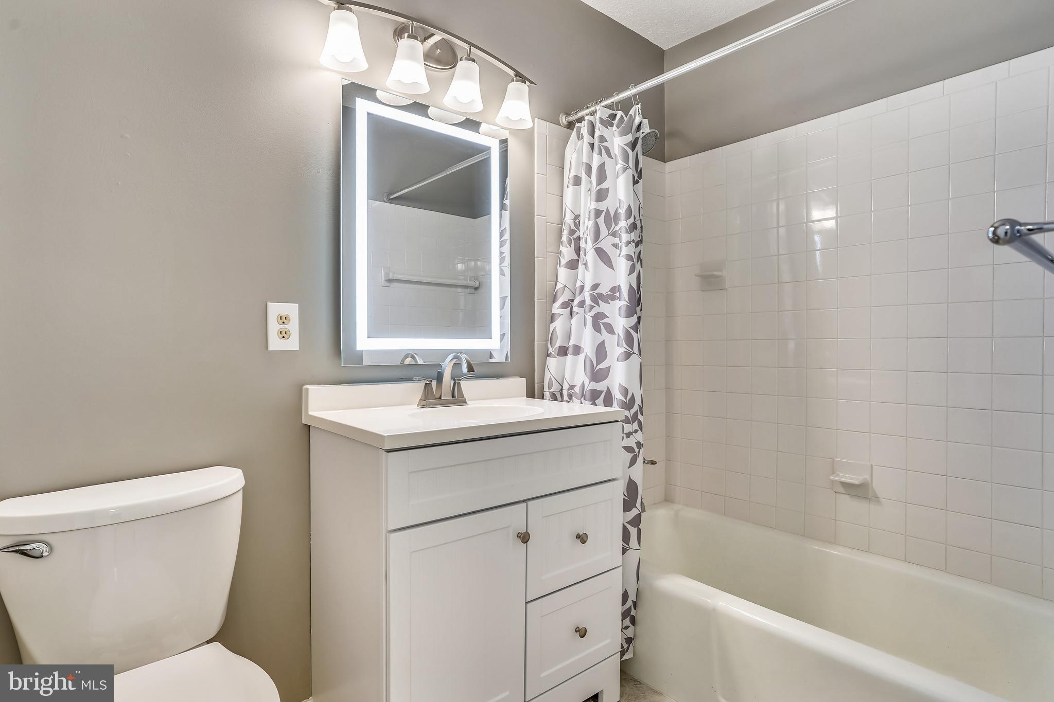 2432 Southgate Square Reston, VA 20191 - Photo 17 of 40 Updated Tiled Bathroom Upper Level