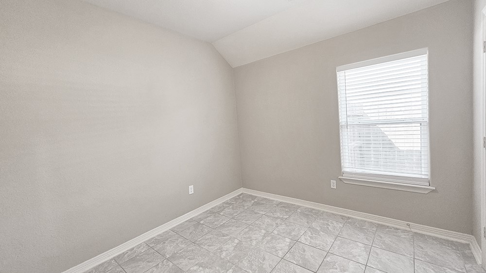 8031 Canyon Street Houston, TX 77051 - Photo 15 of 17 an empty room with a window