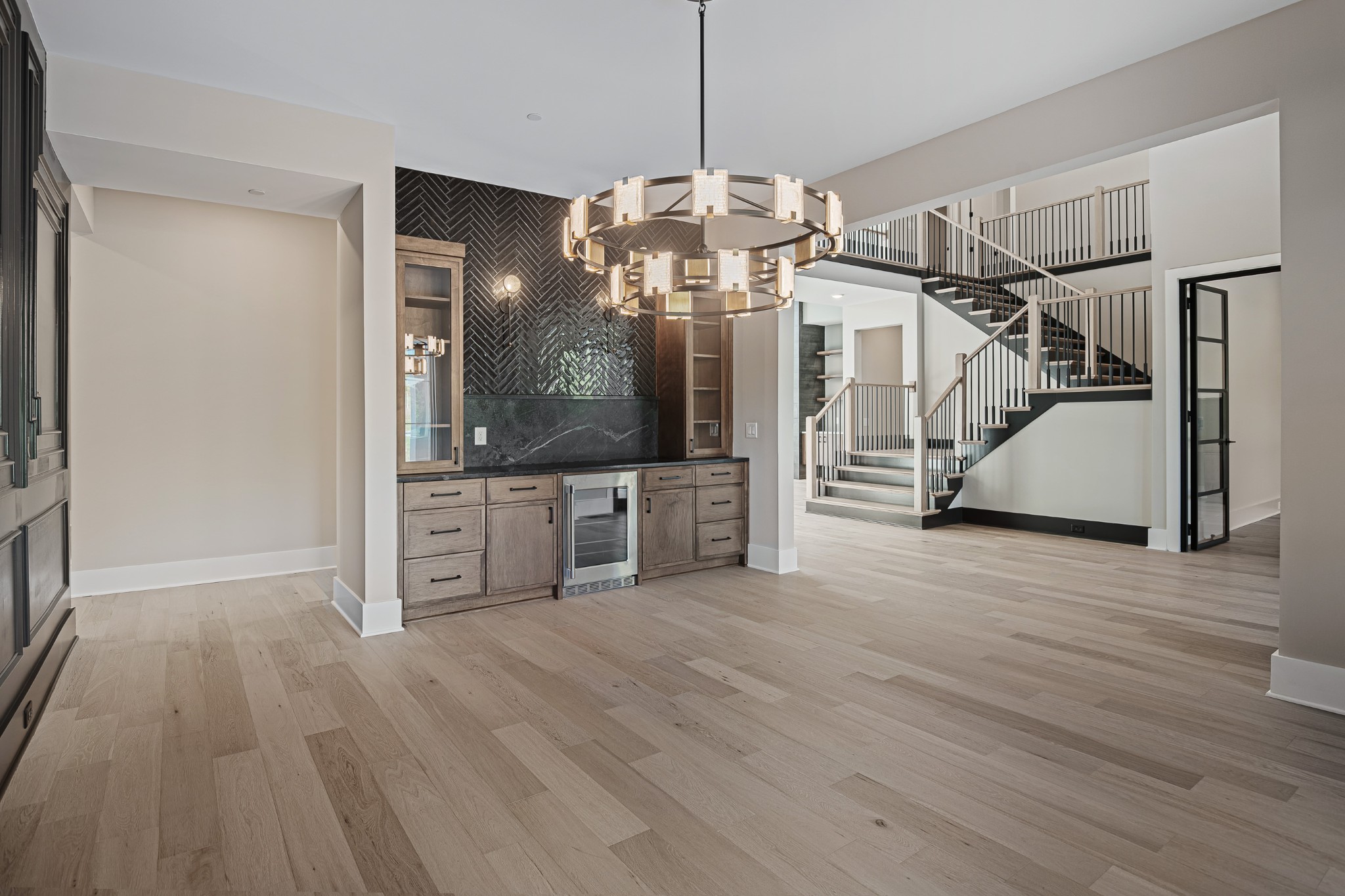 1760 Dean Road Thompson's Station, TN 37179 - Photo 13 of 49 a view of a kitchen with cabinets and wooden floor