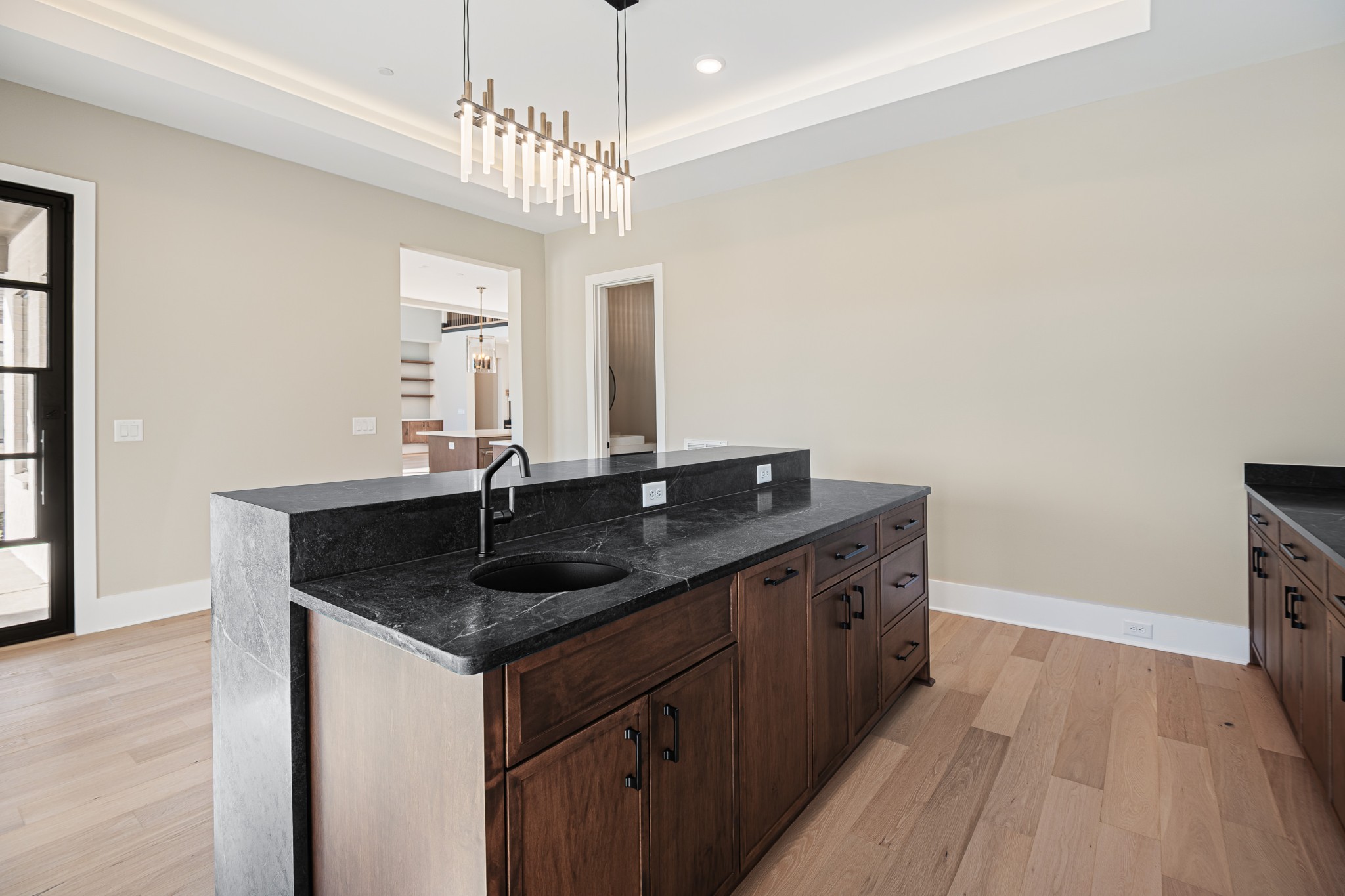 1760 Dean Road Thompson's Station, TN 37179 - Photo 27 of 49 a kitchen with a sink and a refrigerator
