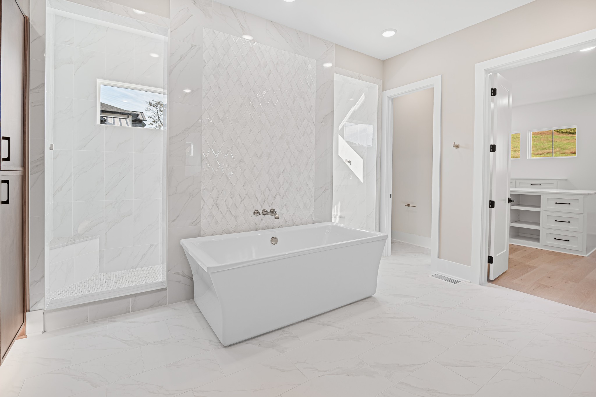 1760 Dean Road Thompson's Station, TN 37179 - Photo 33 of 49 a bathroom with a tub shower and a sink