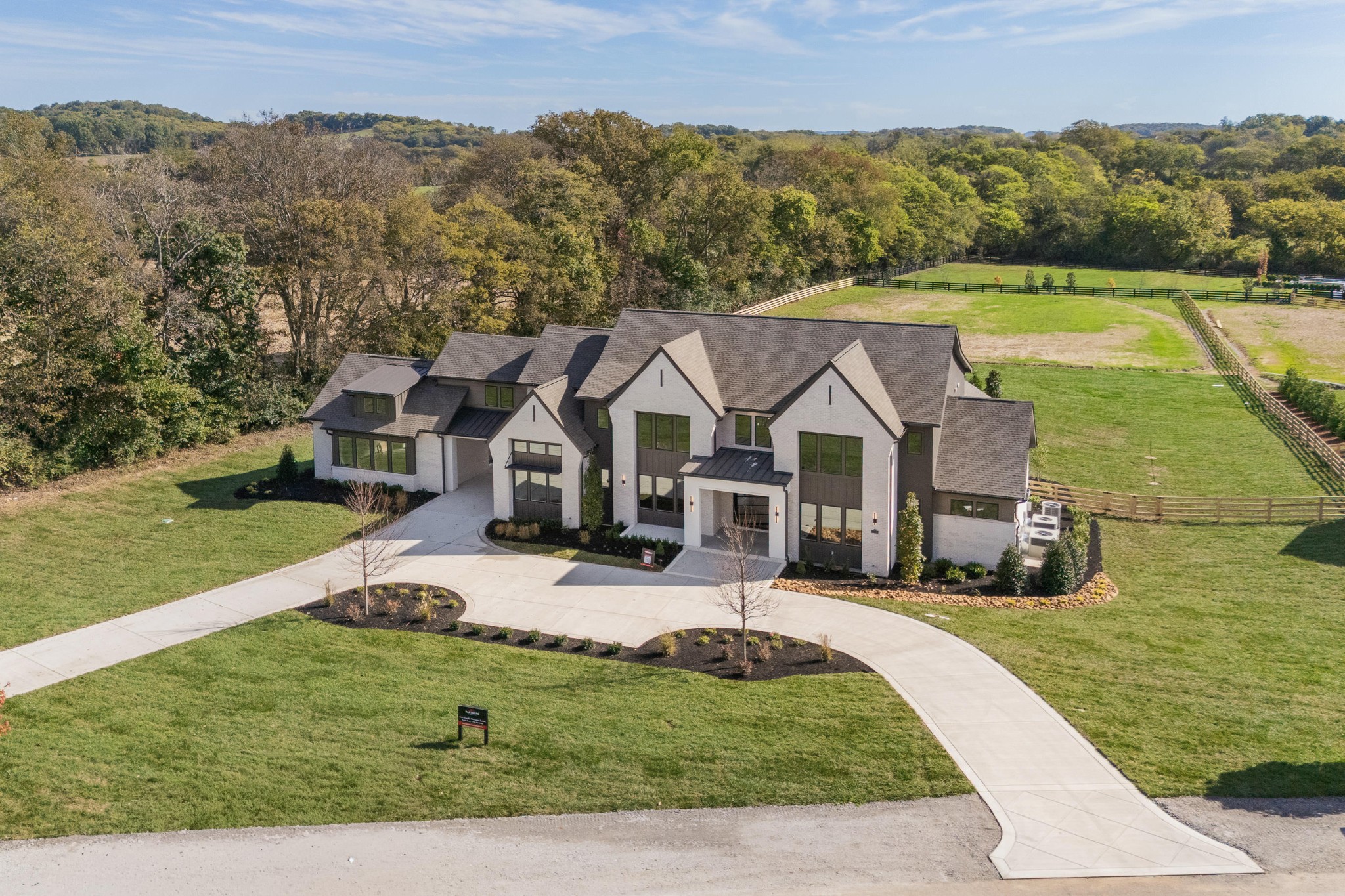 1760 Dean Road Thompson's Station, TN 37179 - Photo 47 of 49 an aerial view of a house with swimming pool and mountain view