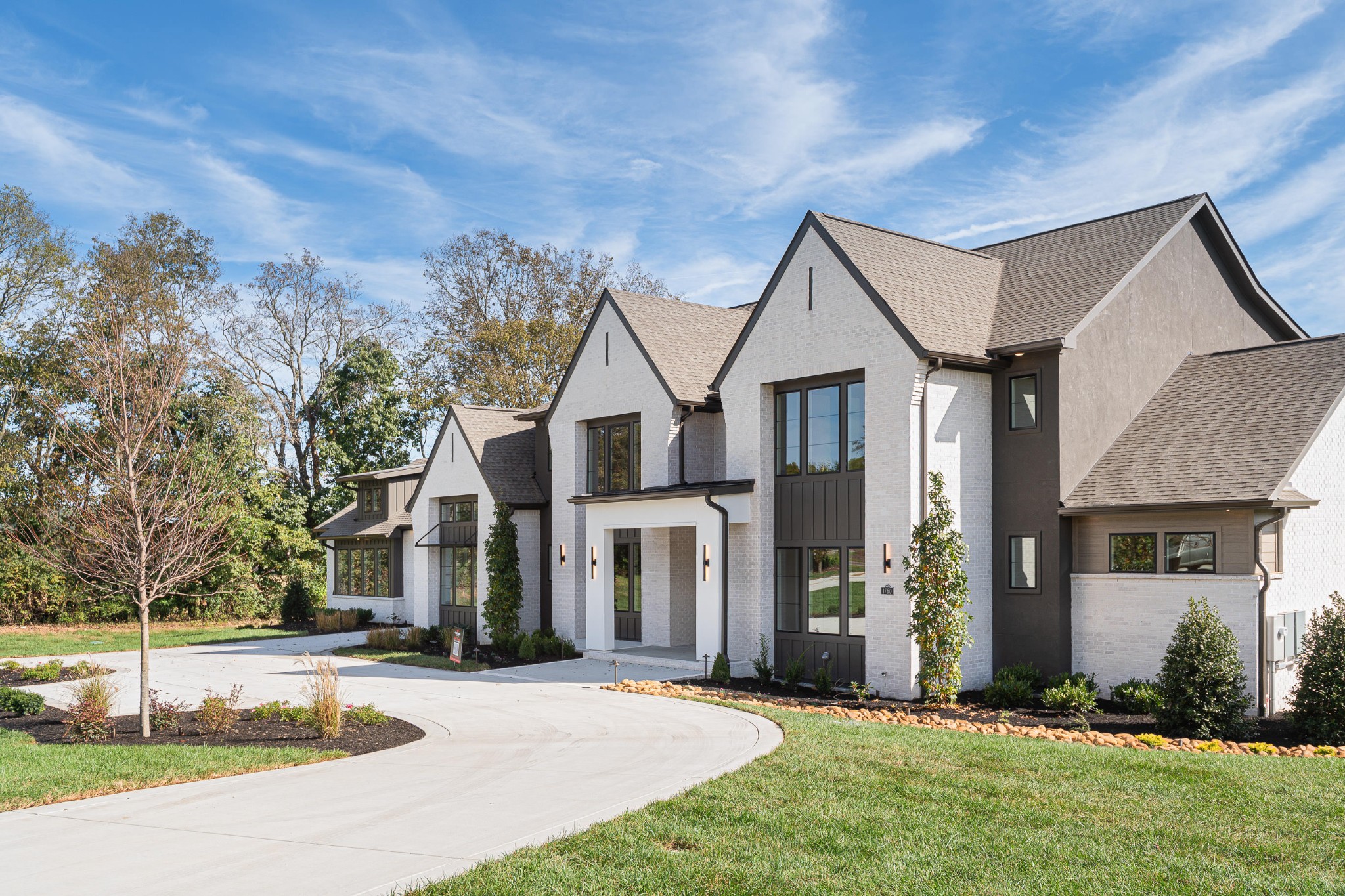 1760 Dean Road Thompson's Station, TN 37179 - Photo 5 of 49 a view of a white house with a big yard and large tree