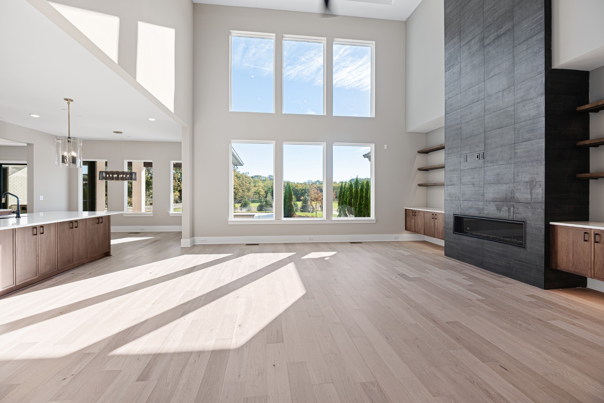 1760 Dean Road Thompson's Station, TN 37179 - Photo 10 of 49 an empty room with wooden floor and windows